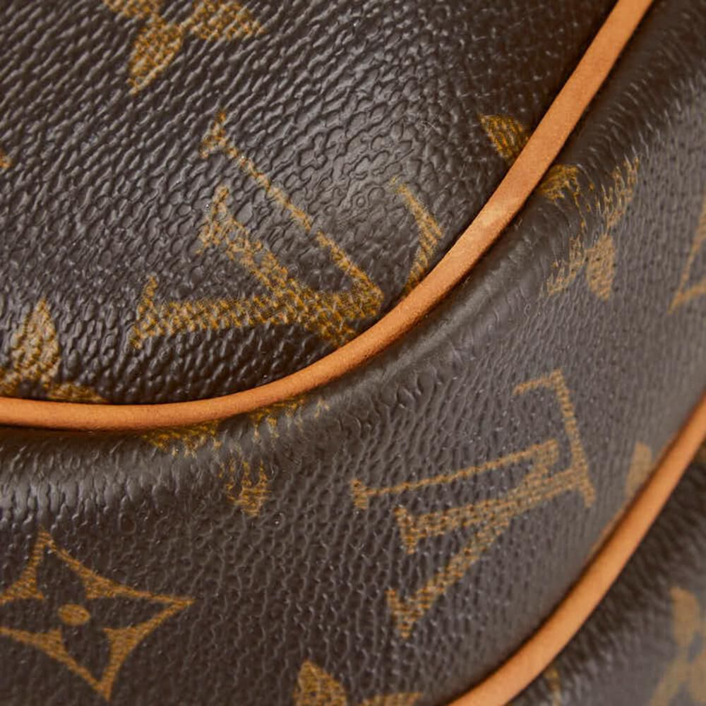 Louis Vuitton Reporter