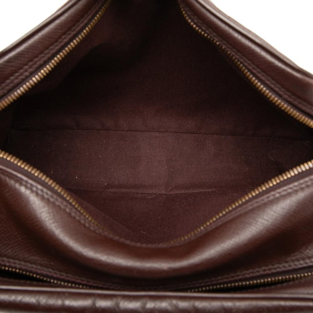 Louis Vuitton Reporter