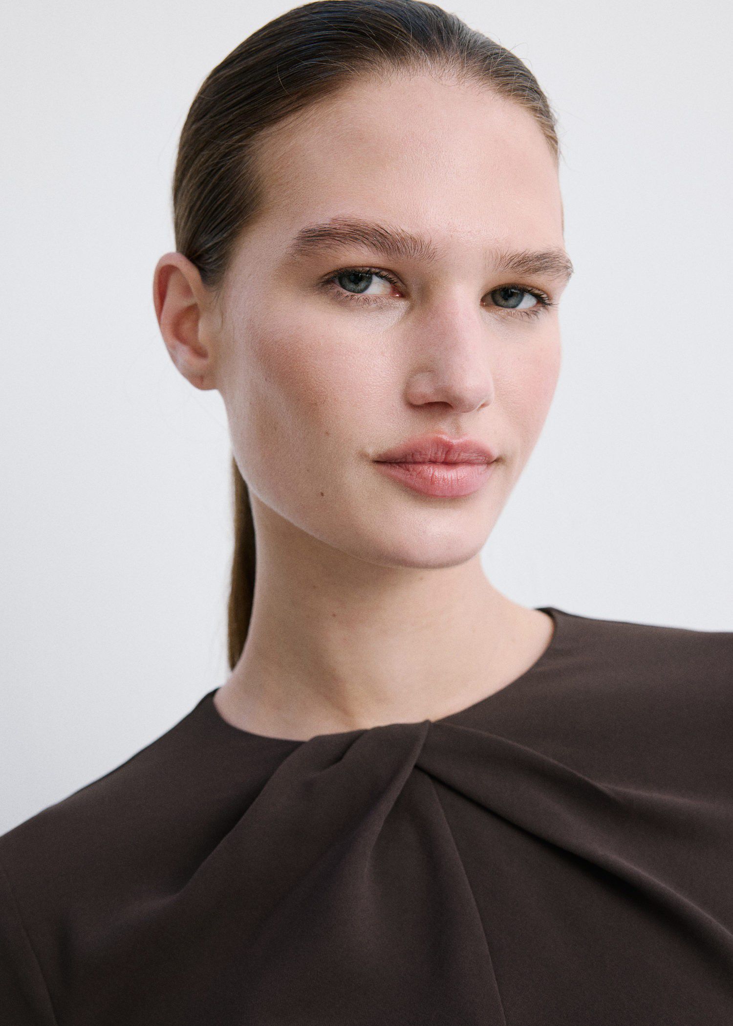 Long-sleeved dress with draped neck