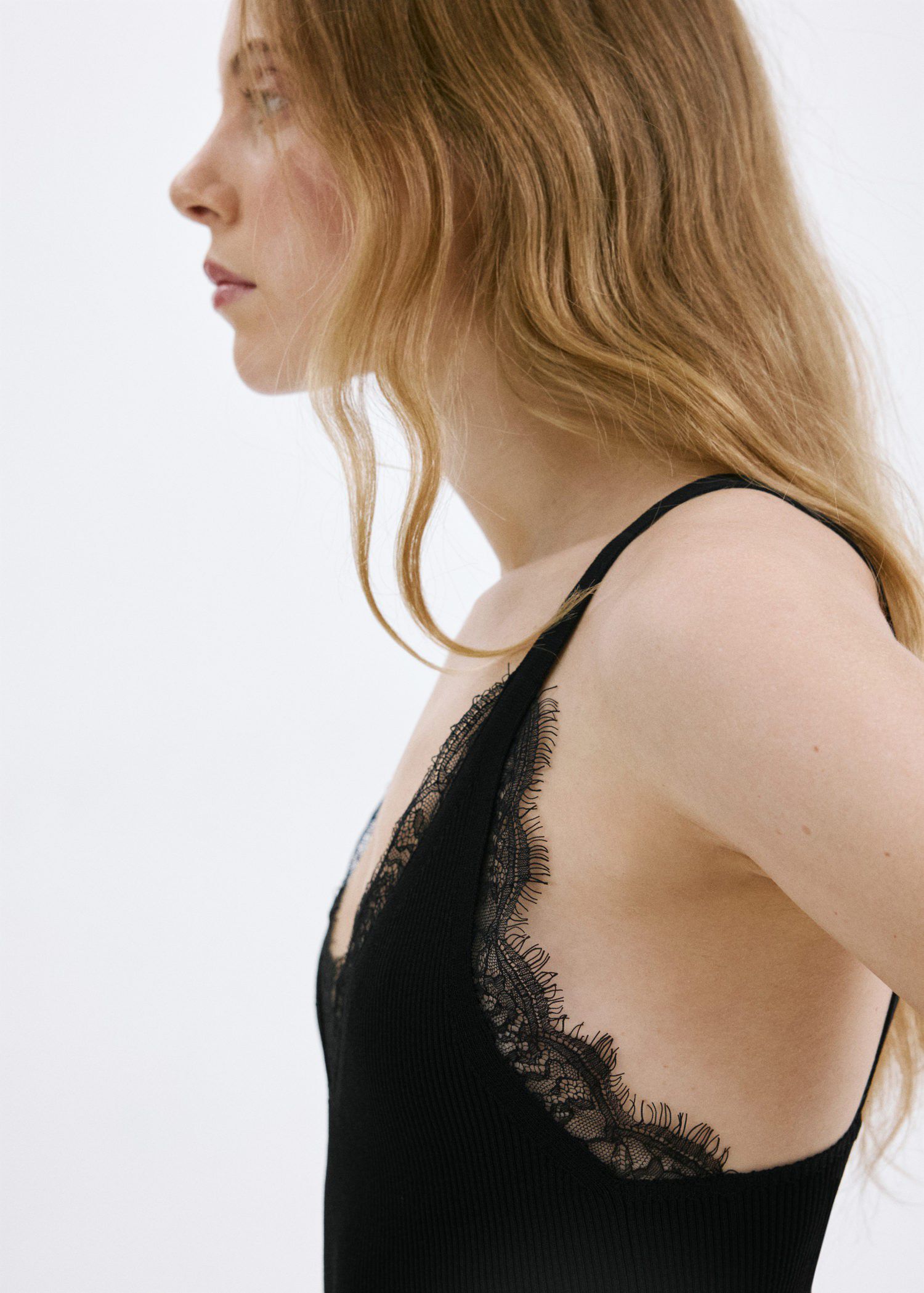 Asymmetrical lace-trimmed top