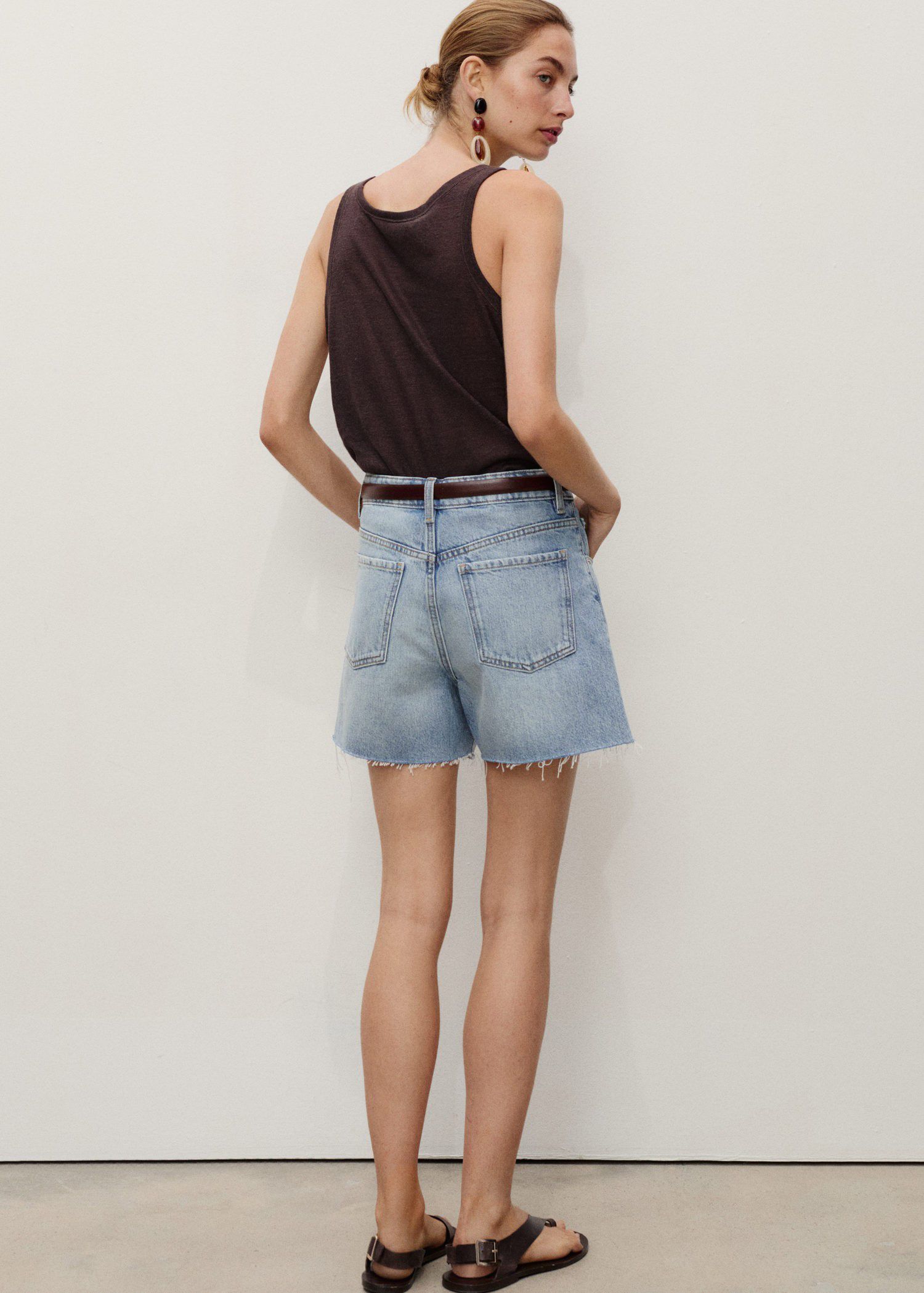 Denim shorts with frayed hem