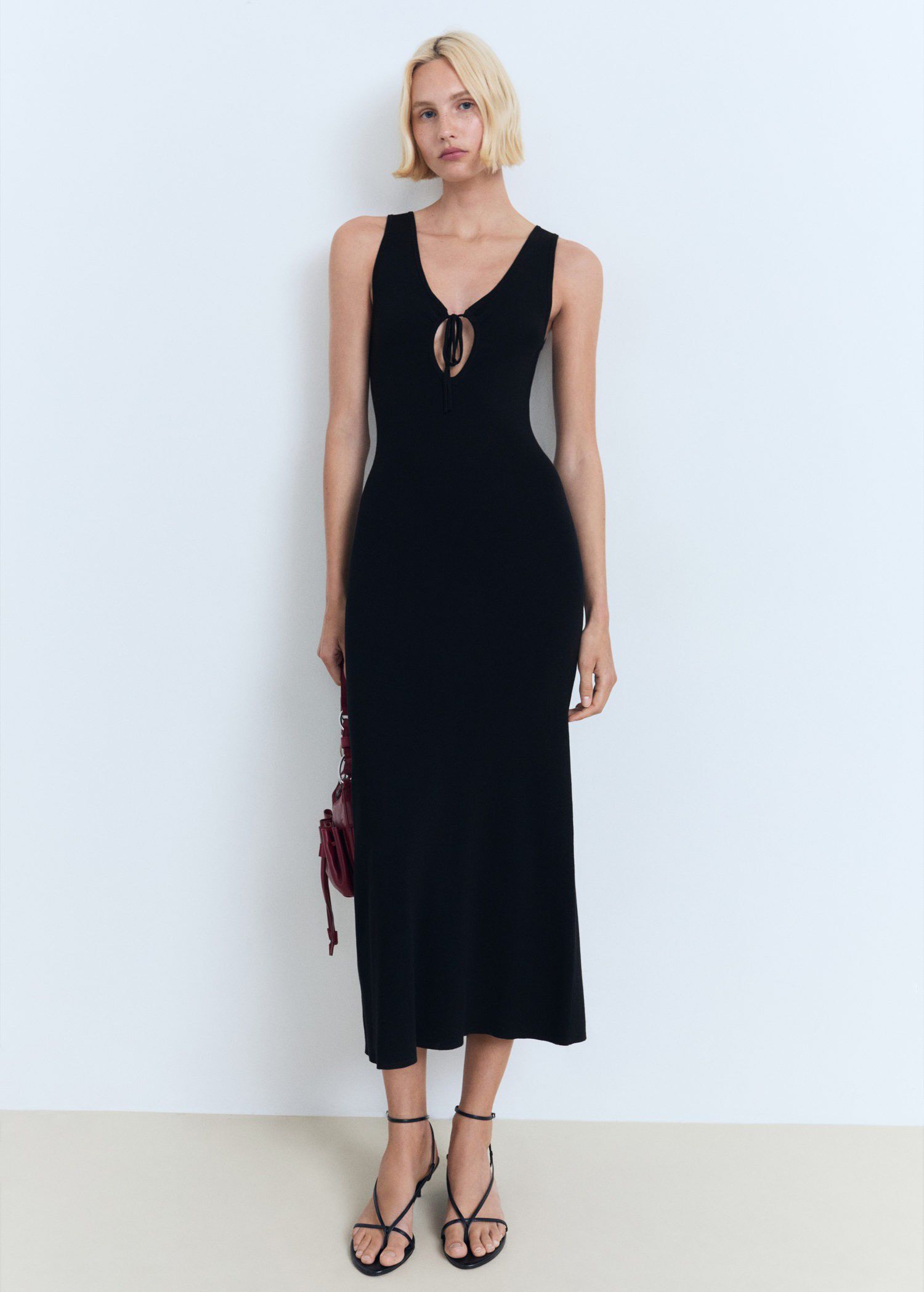 Knitted dress with bow neckline