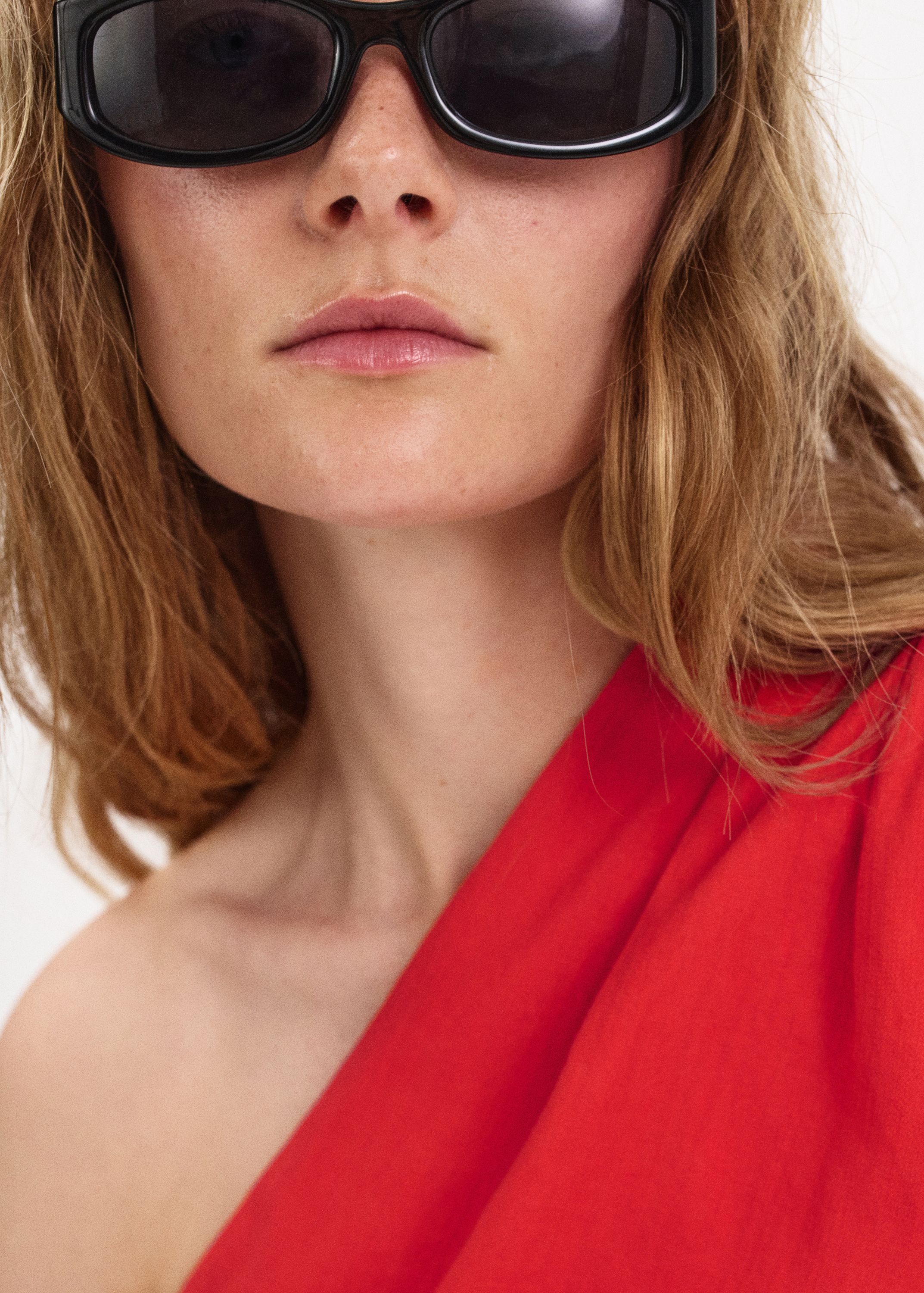 Asymmetric top with draped detail
