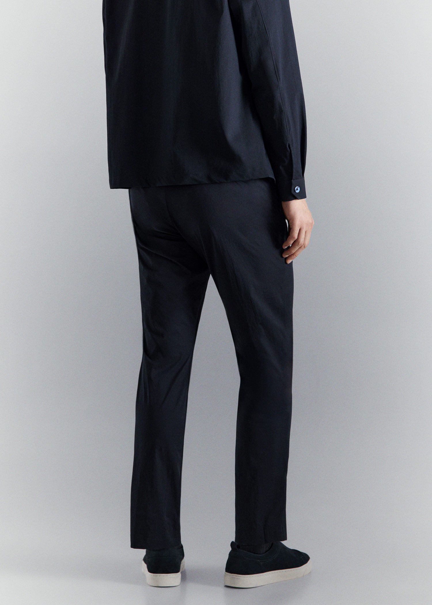 Stretch fabric slim-fit trousers wi