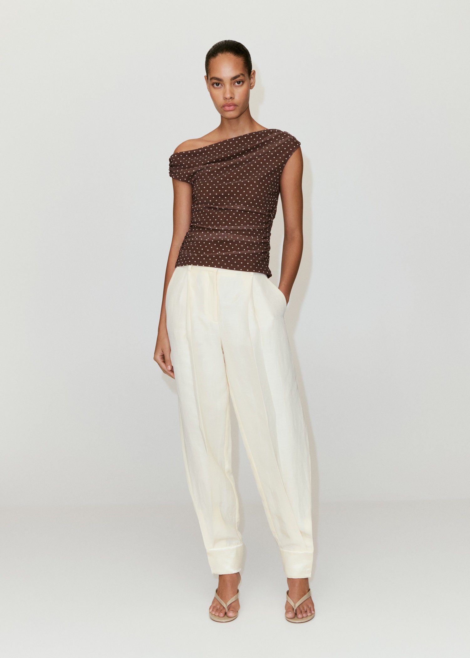 Asymmetric polka dot top