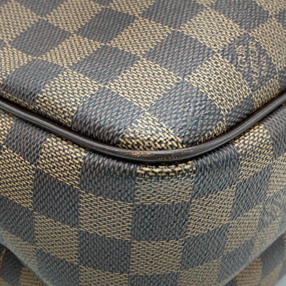 Louis Vuitton Reporter