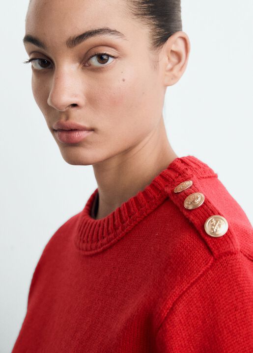 Knitted sweater with jewel buttons