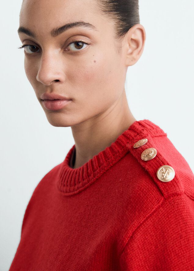 Knitted sweater with jewel buttons