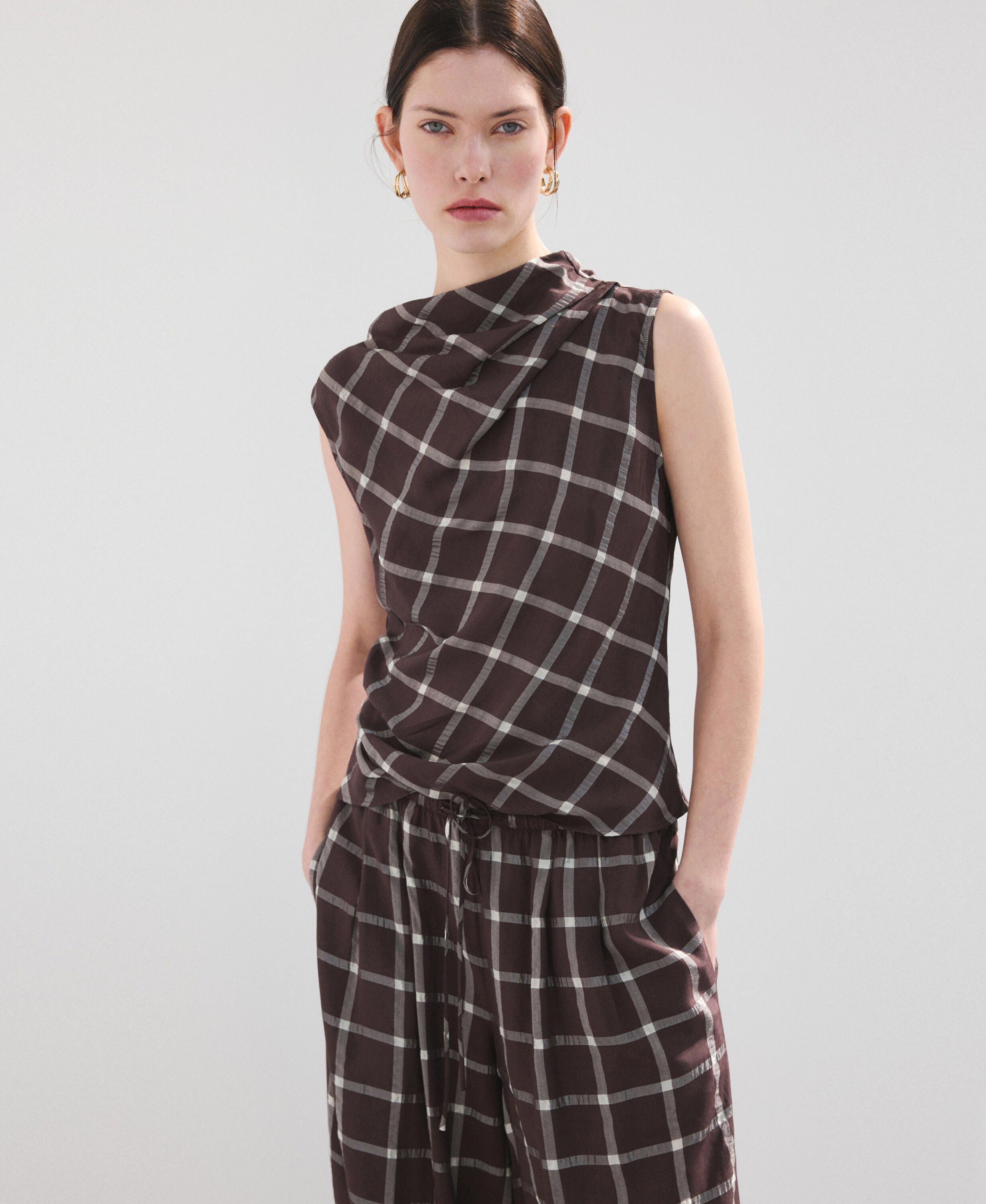 Fitted top with draped neckline