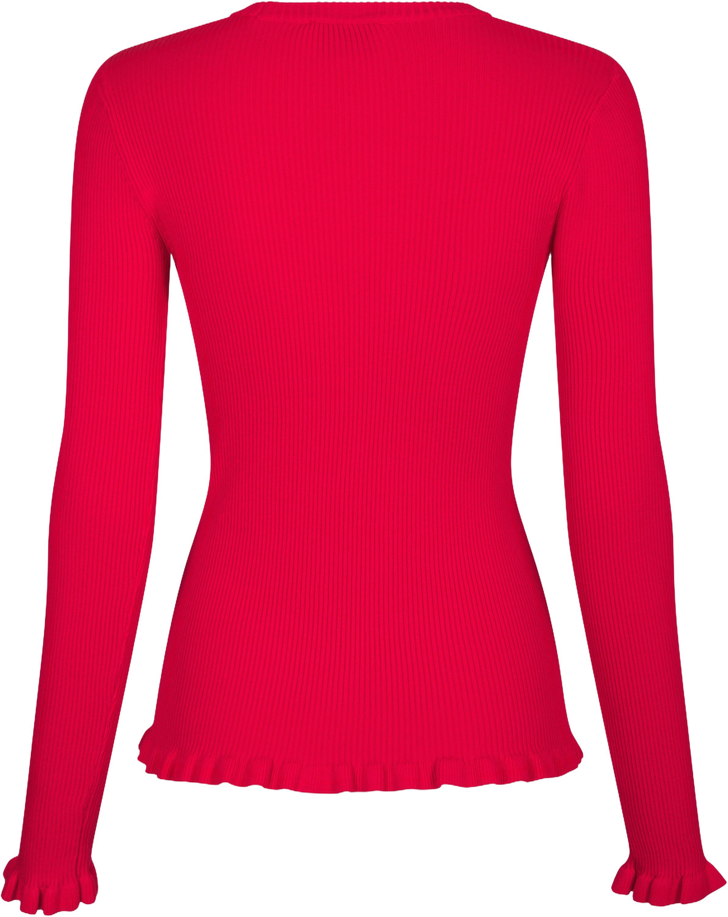 Nelle solid stickad blus