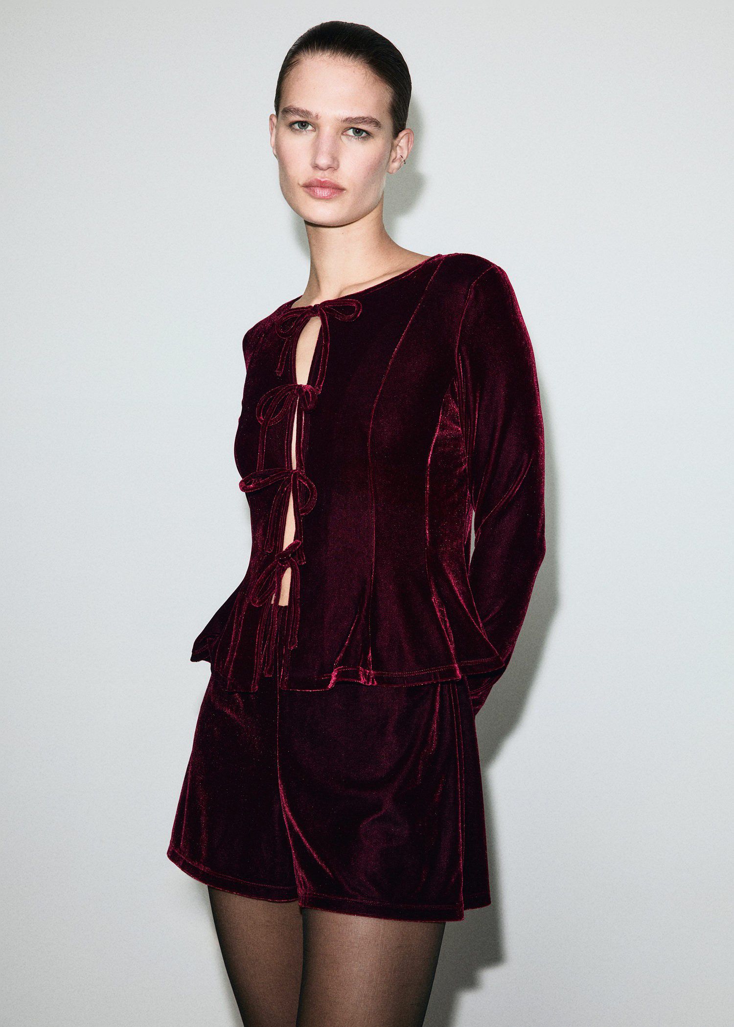 Velvet blouse with bows