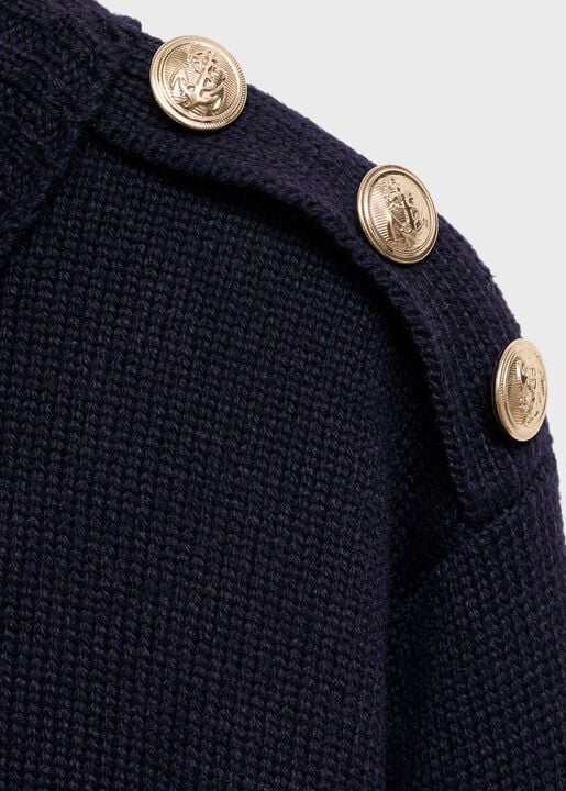Knitted sweater with jewel buttons