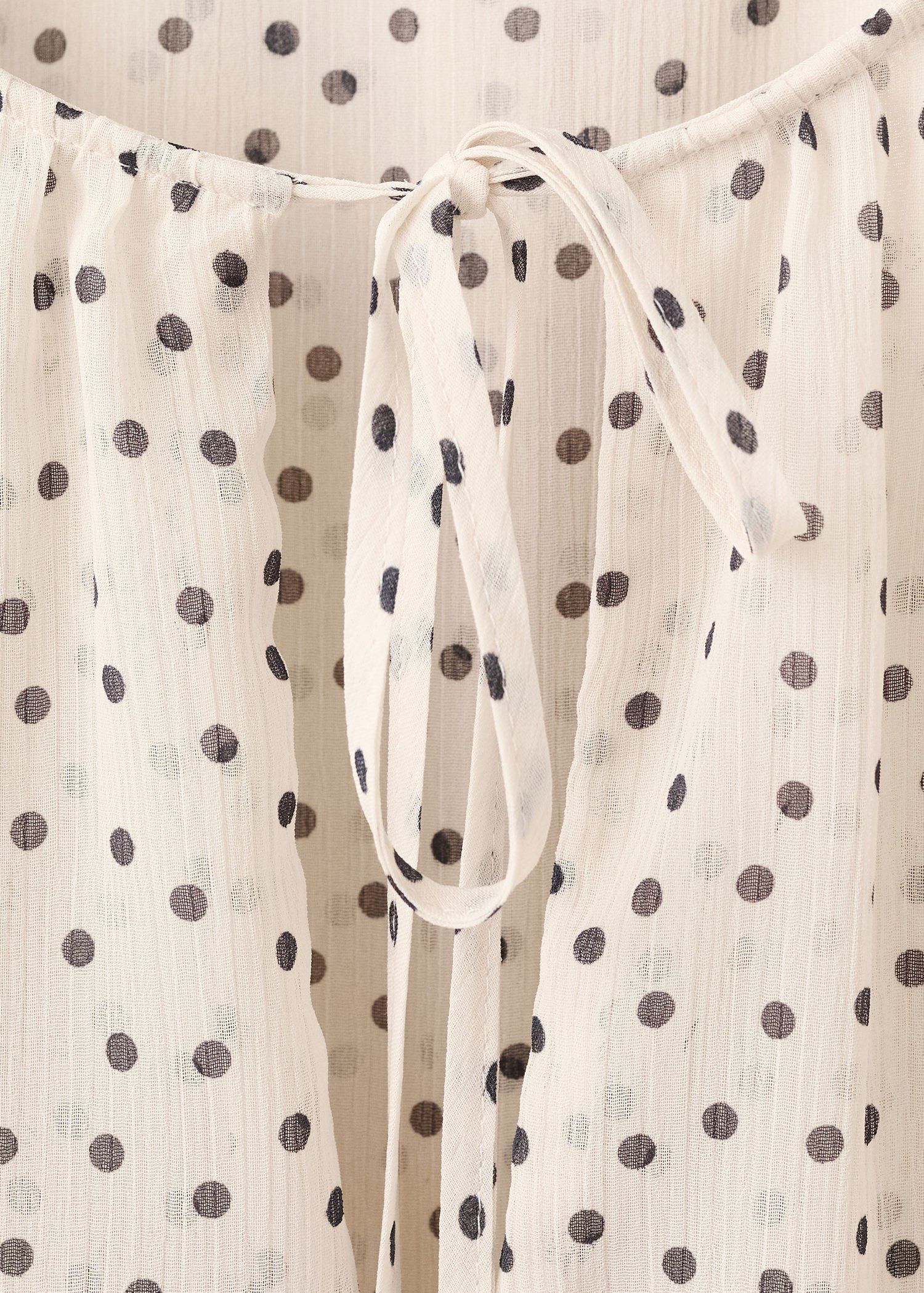 Bow polka-dot blouse