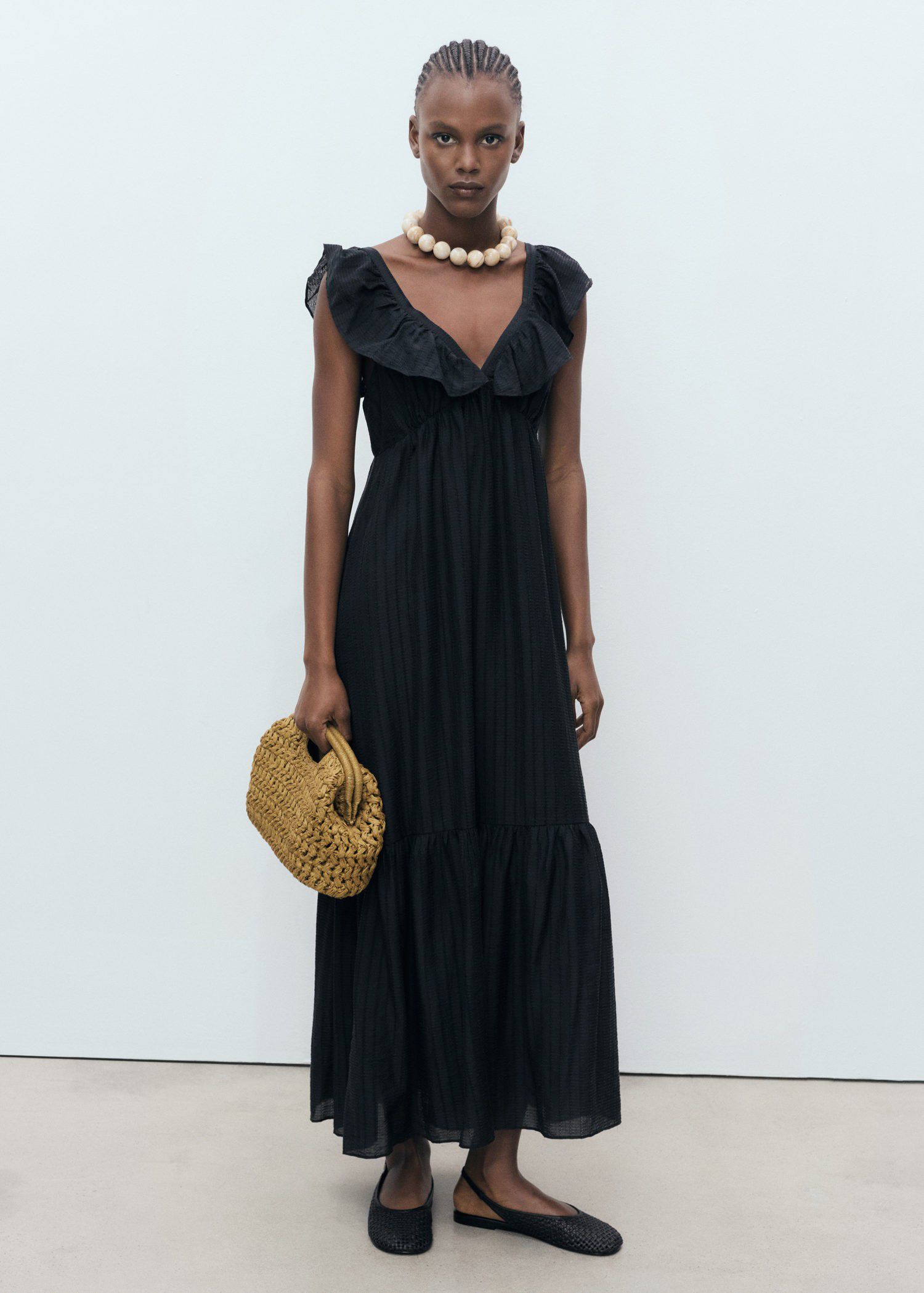 Long dress with ruffle neckline