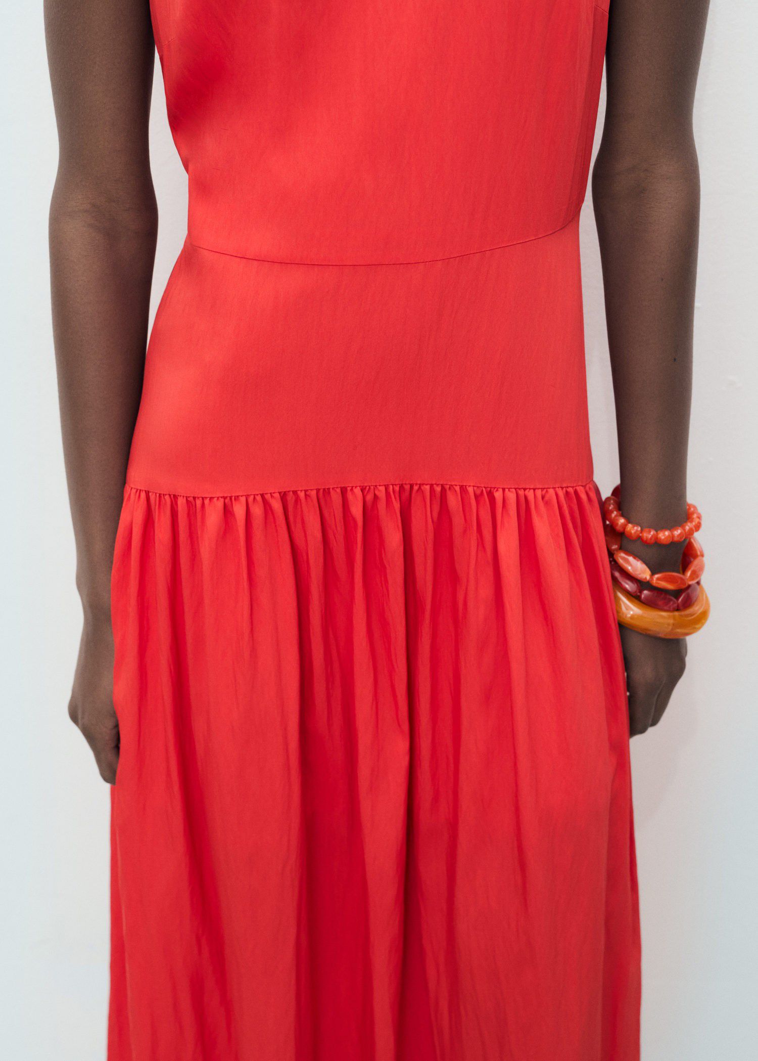 Long dress with gathered hem