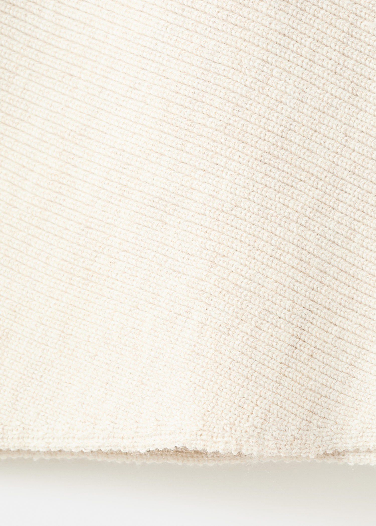 Sweater with asymmetrical neck and