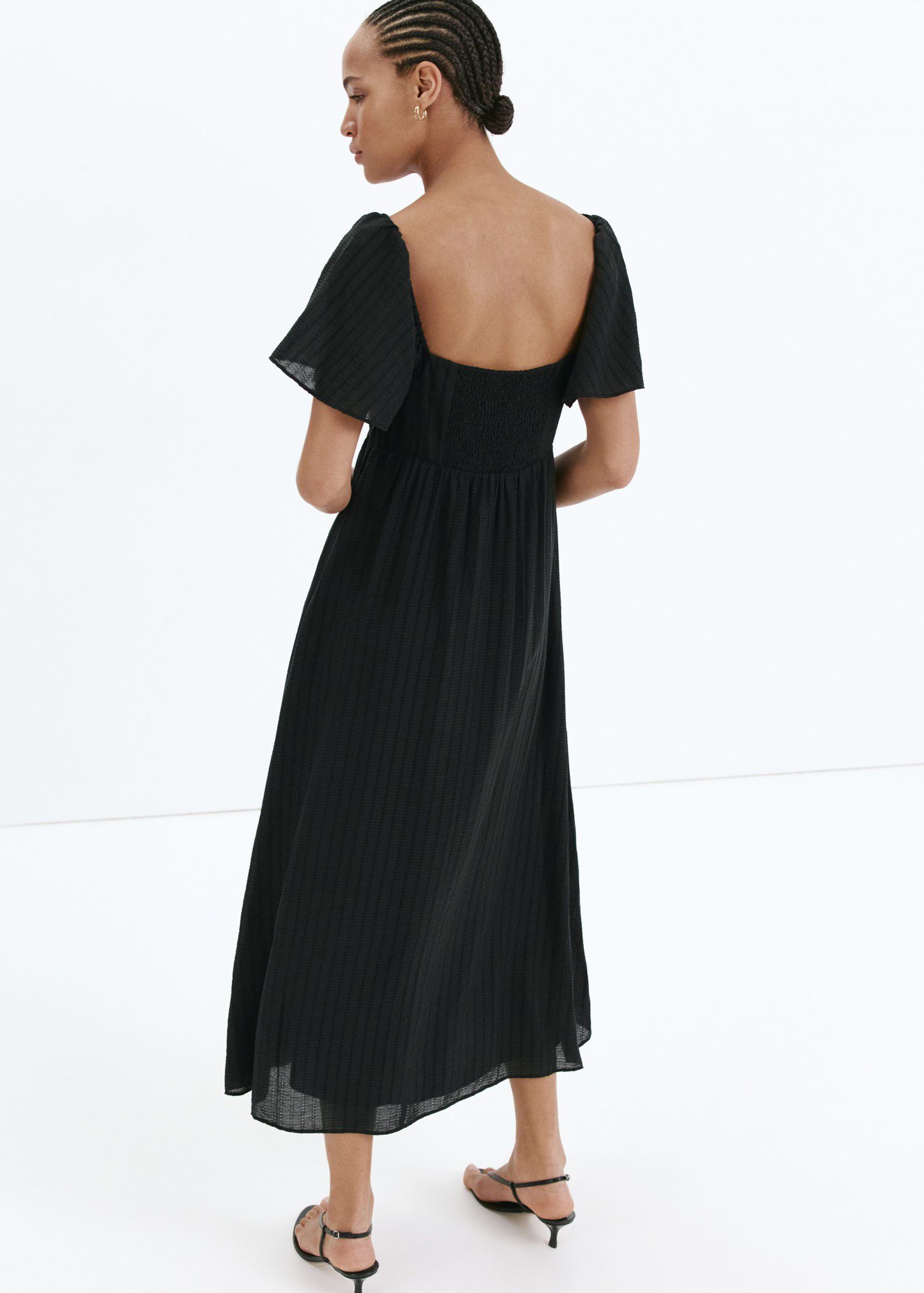 Textured dress with ruched detail