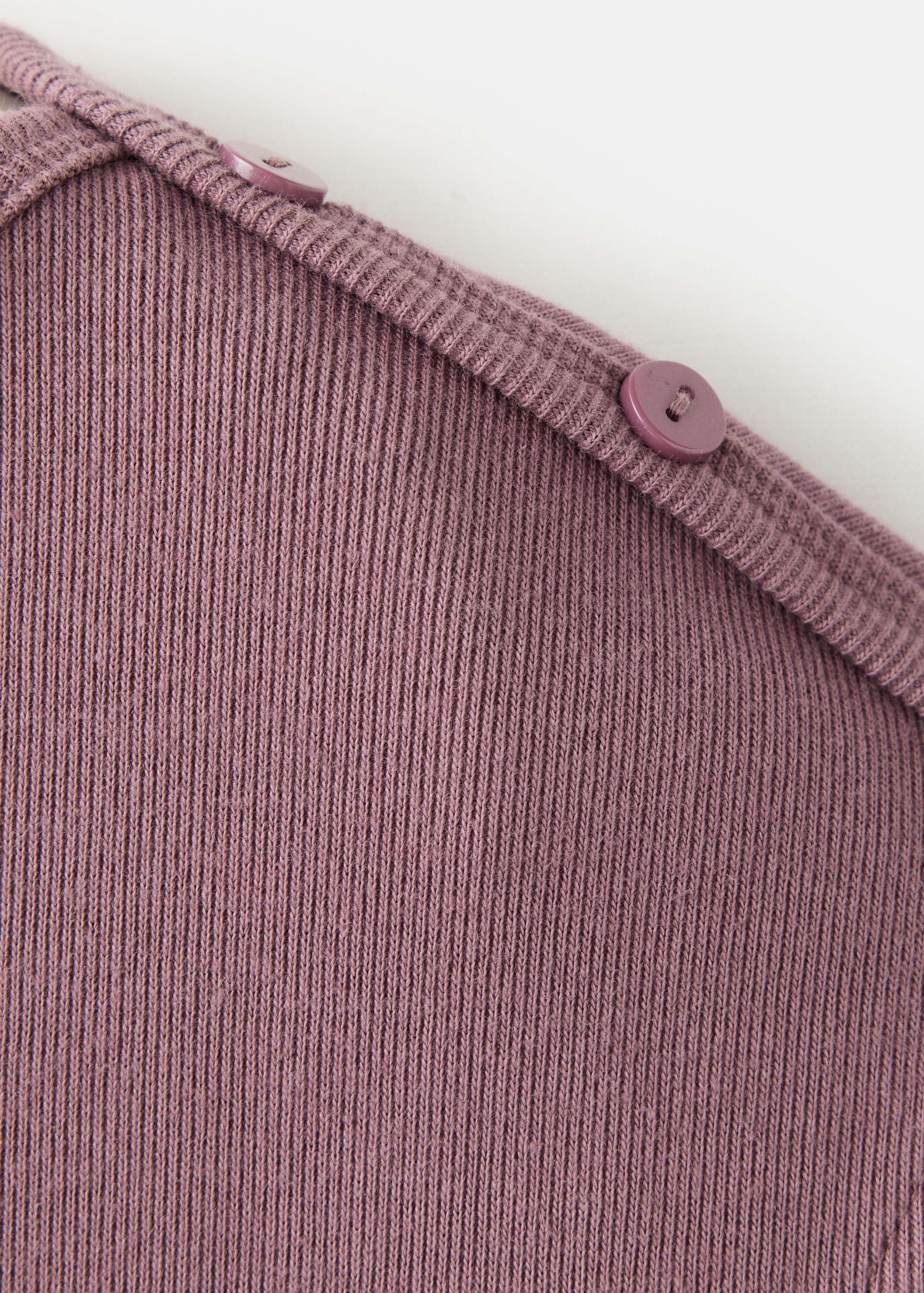 Boat neck top with decorative butto