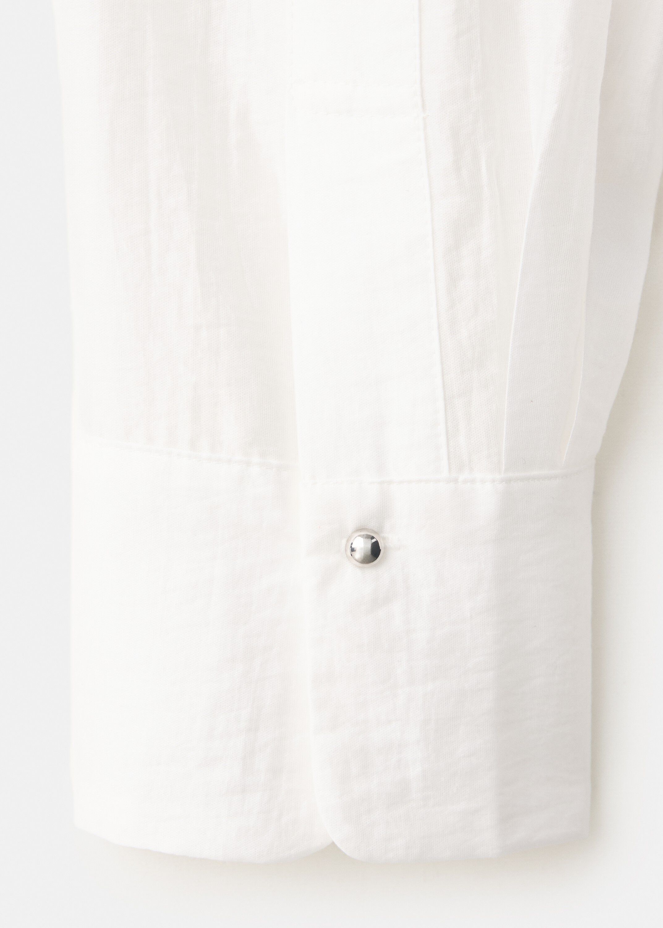Shirt with pintuck detailing and bu