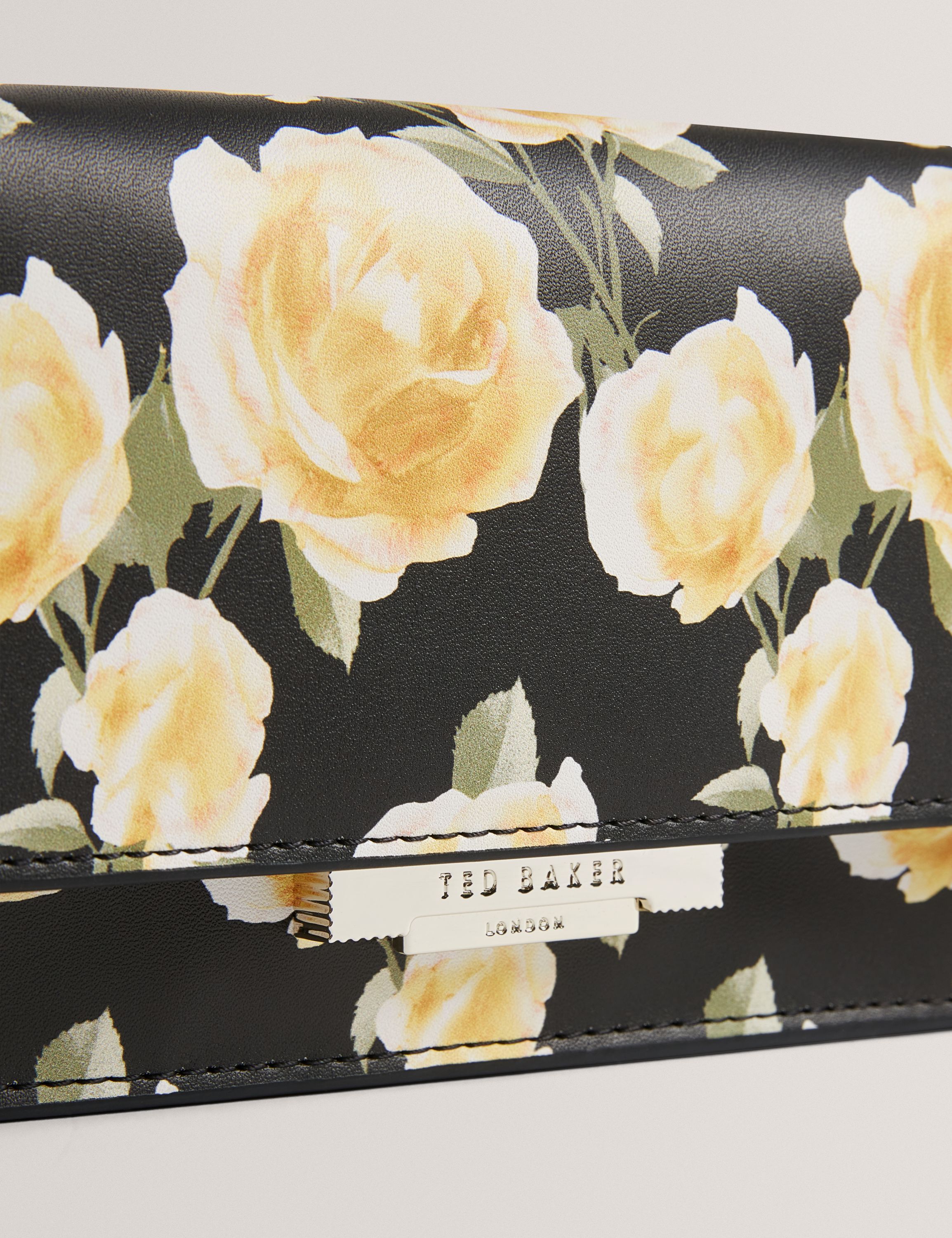 MAHIRYA Printed Lock Purse on a Cha