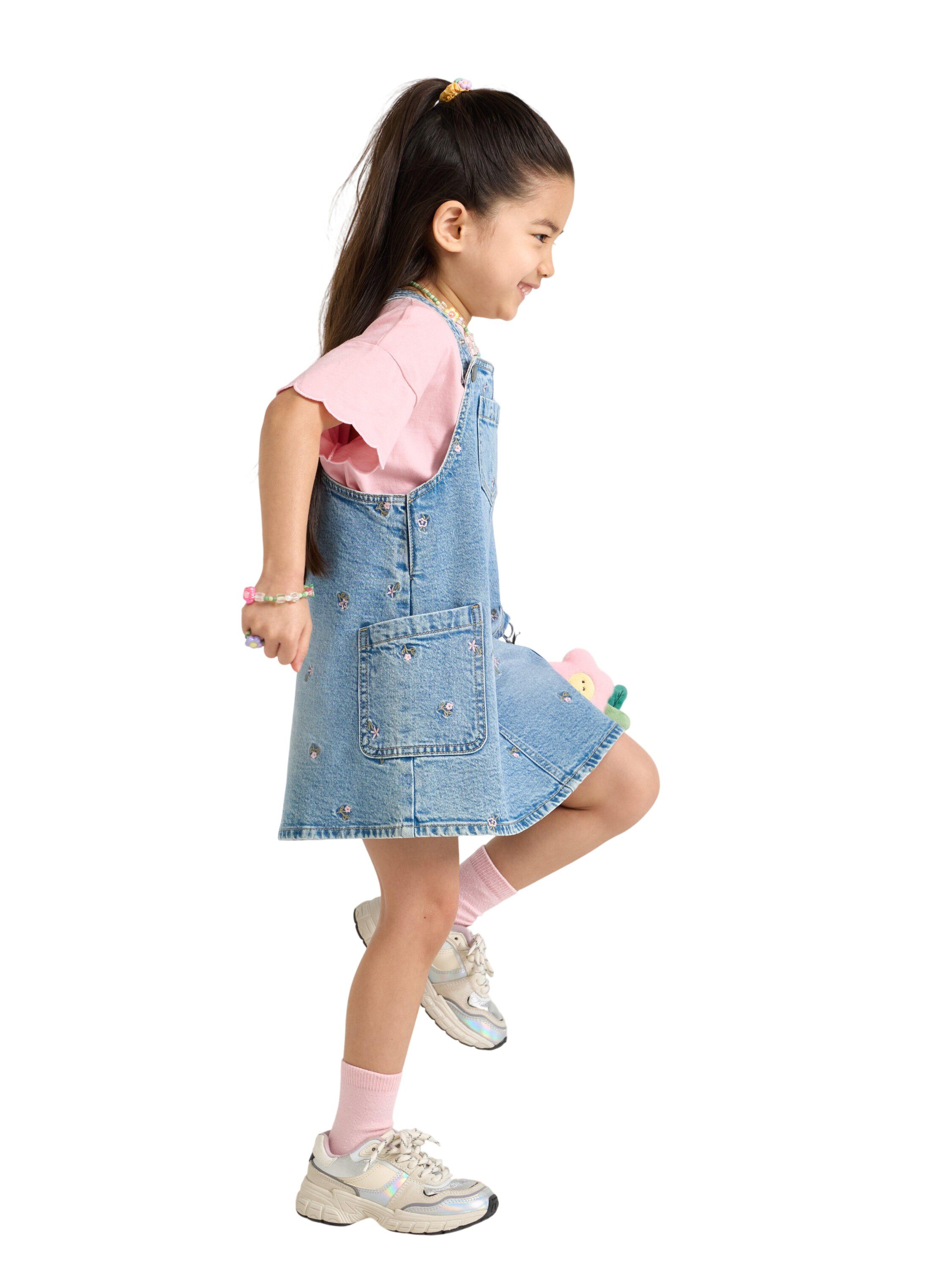 Dungaree dress in denim with embroi
