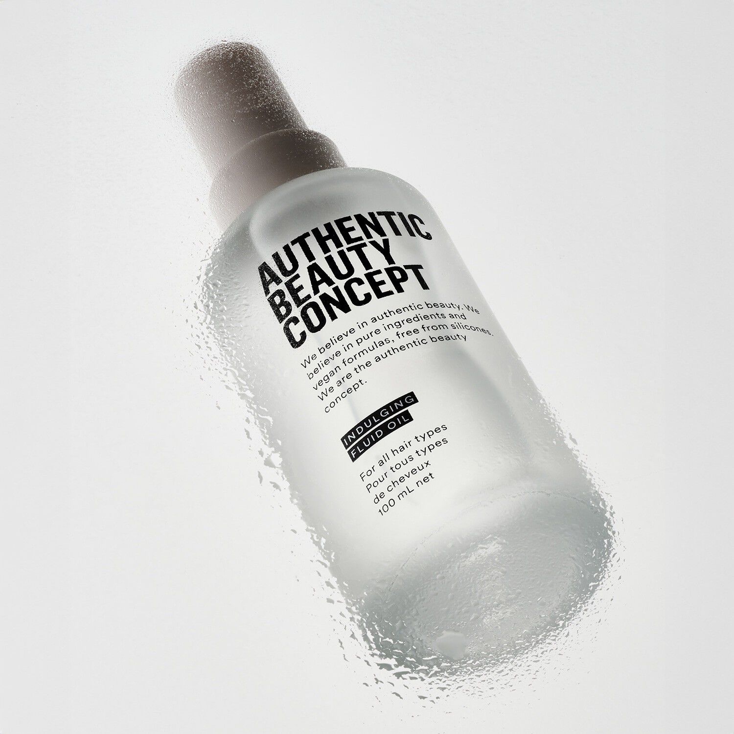 Indulging Fluid Oil - L&auml;tt utj&auml;mnande olja f&ouml;r gl&auml;nsande h&aring;r