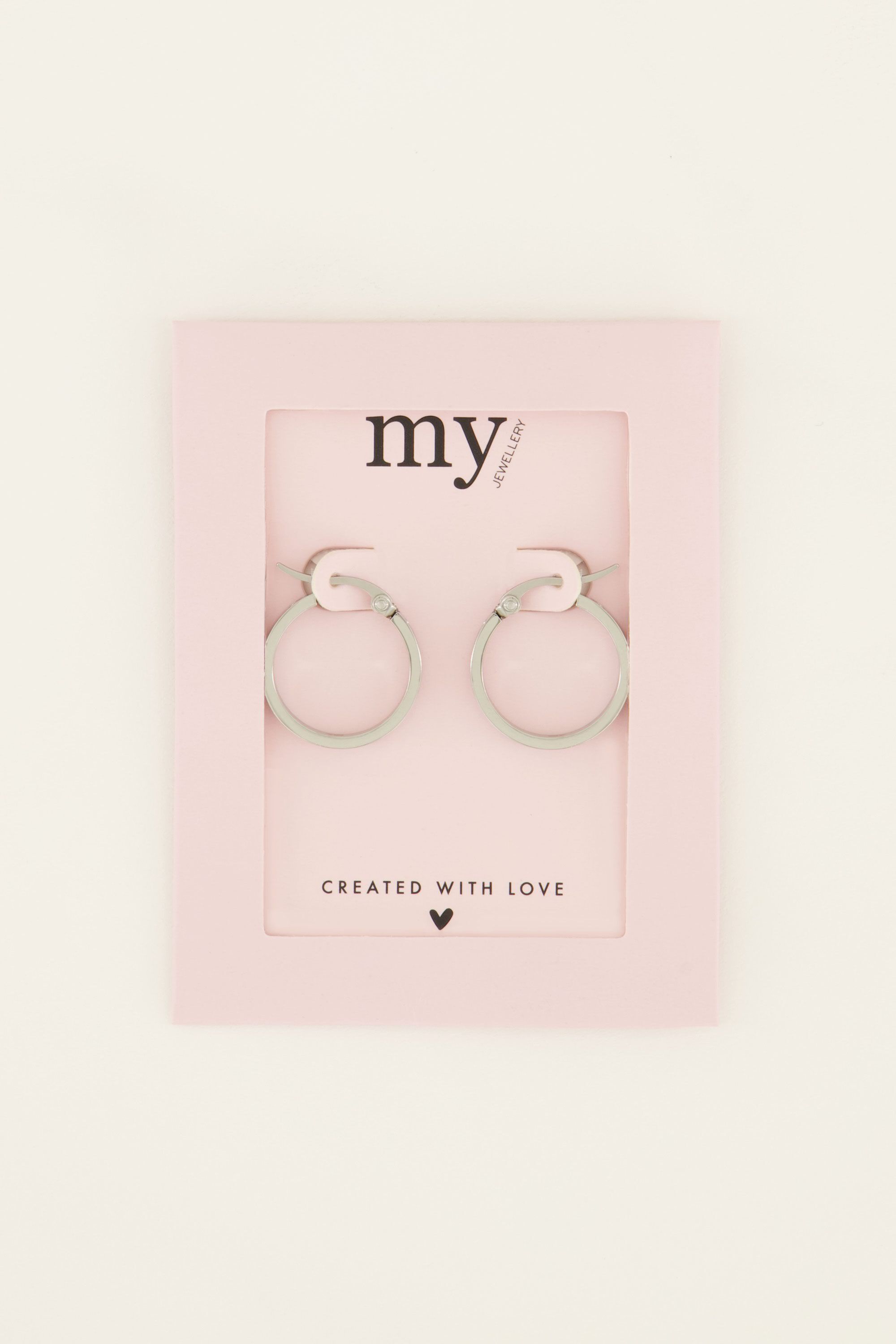 Earrings with engraved hearts