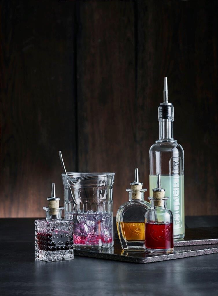 Flaske med st&aring;l-skjenketut Authentica 50 cl