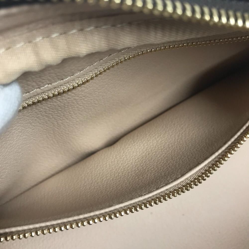 Louis Vuitton Clutch