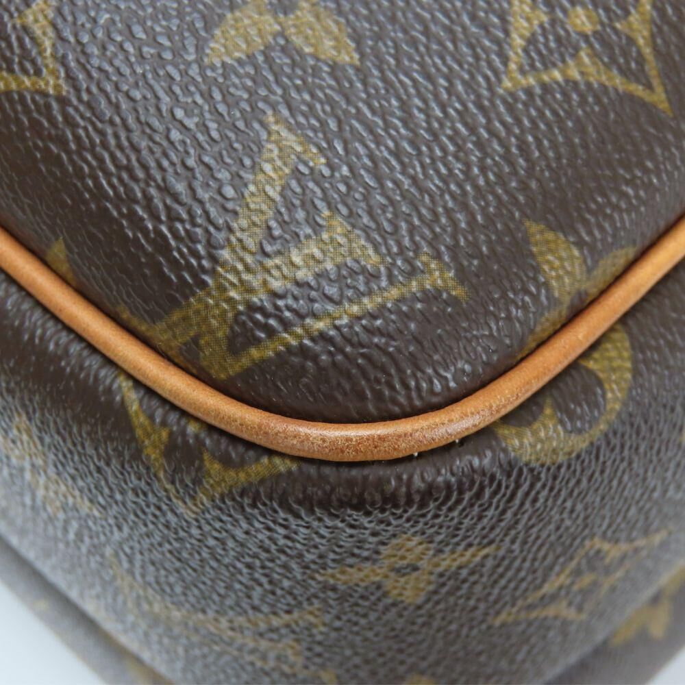 Louis Vuitton Reporter