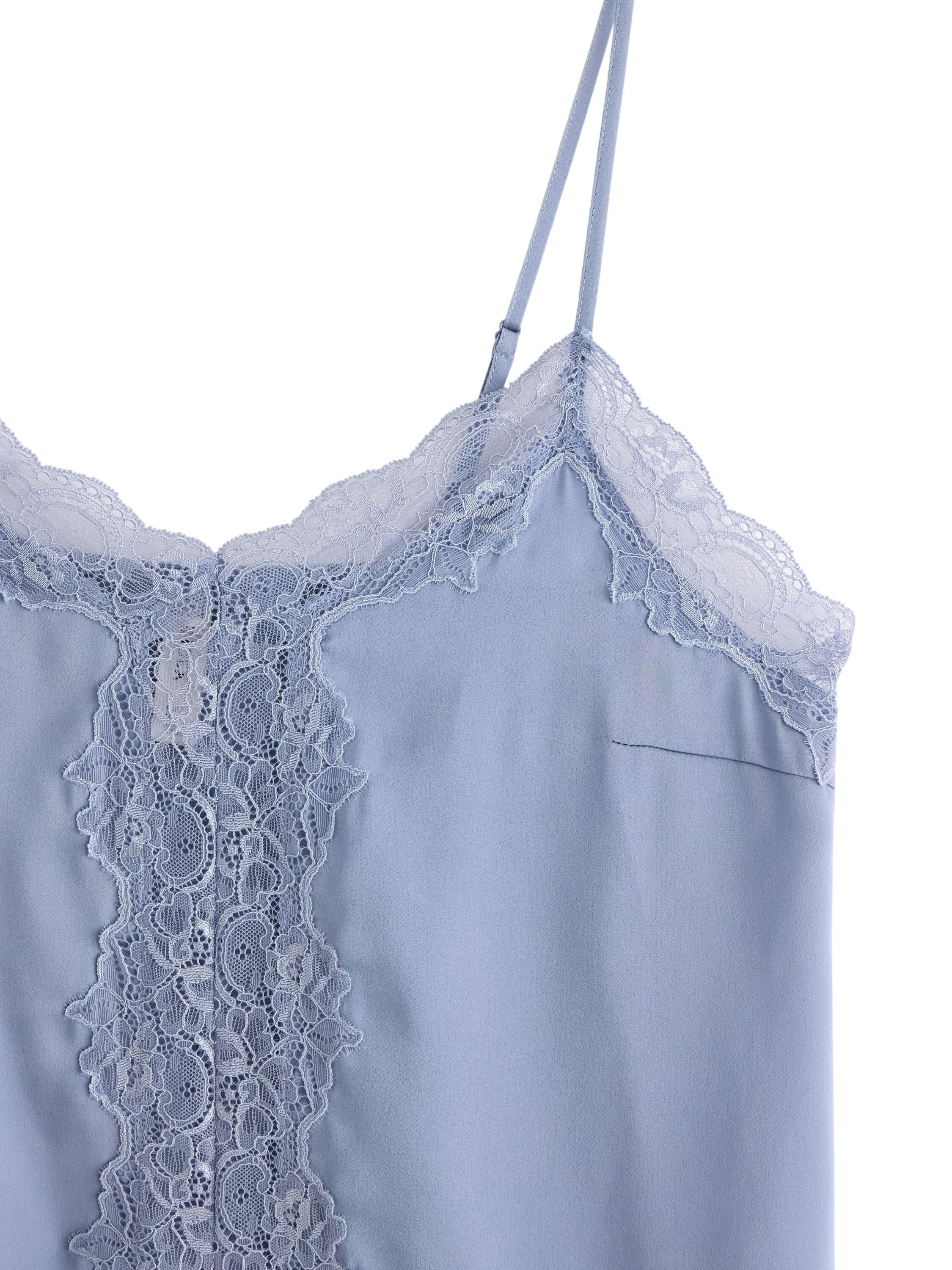 Satin camisole with lace details.