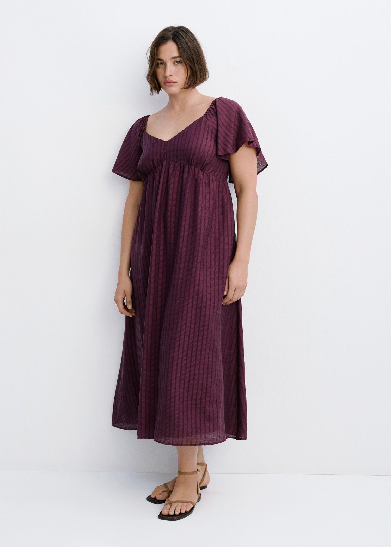 Textured dress with ruched detail