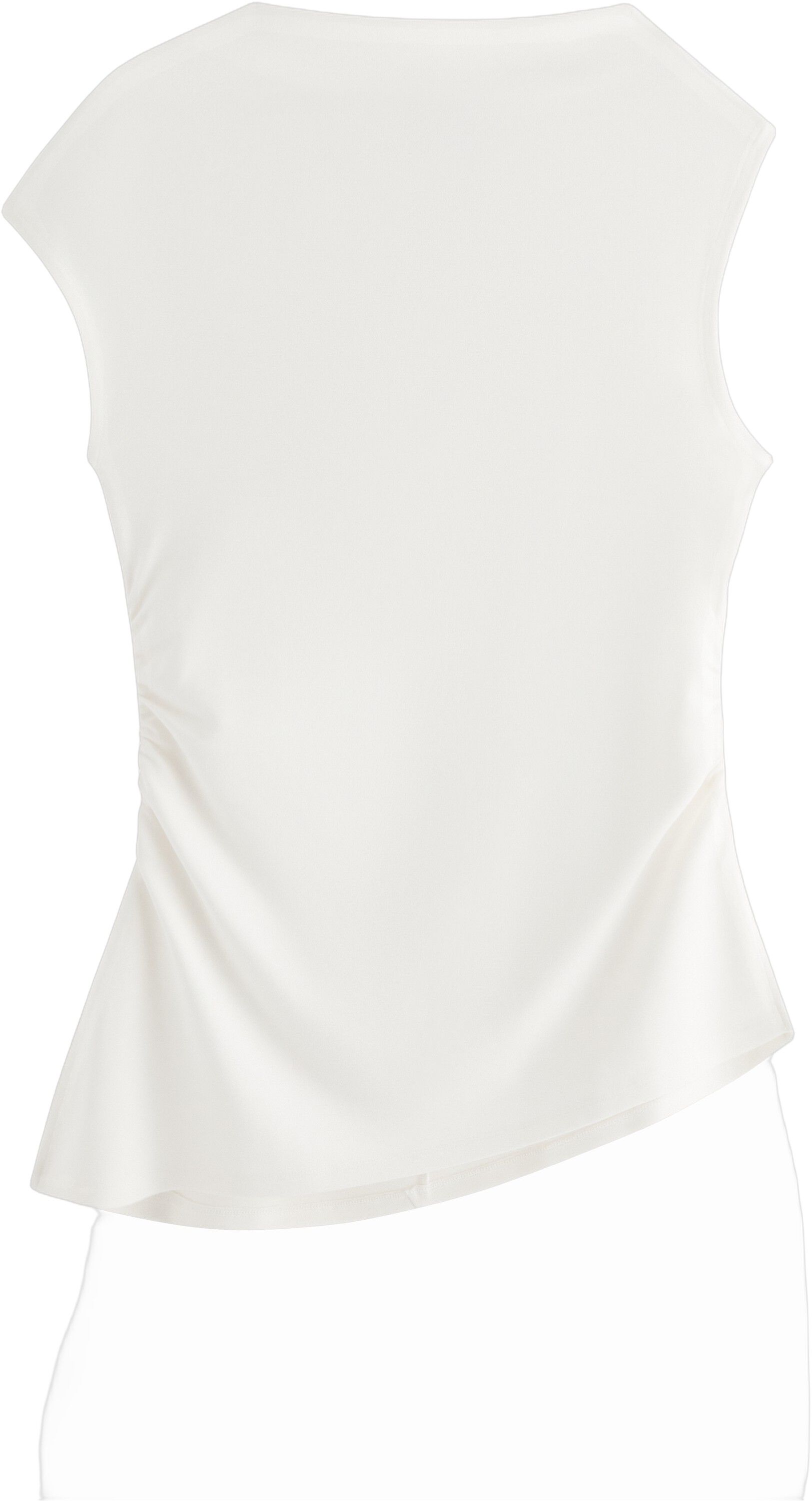 Asymmetrisk topp i mjuk viskos med