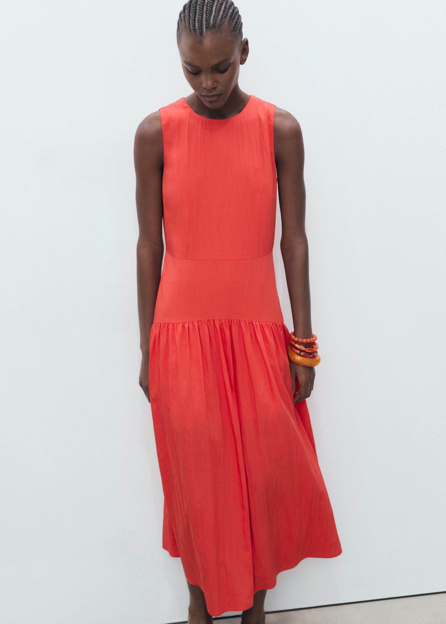 Long dress with gathered hem