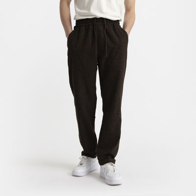 Loose trousers with an adjustable elastic waist