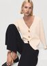 Knitted jacket with jewel buttons