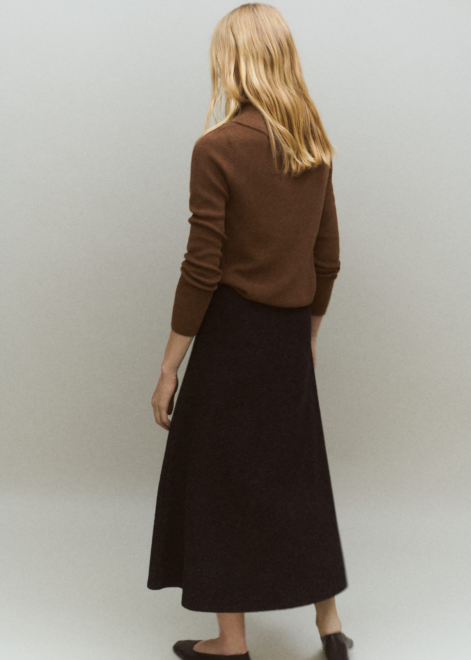 Sweater with asymmetrical neck and