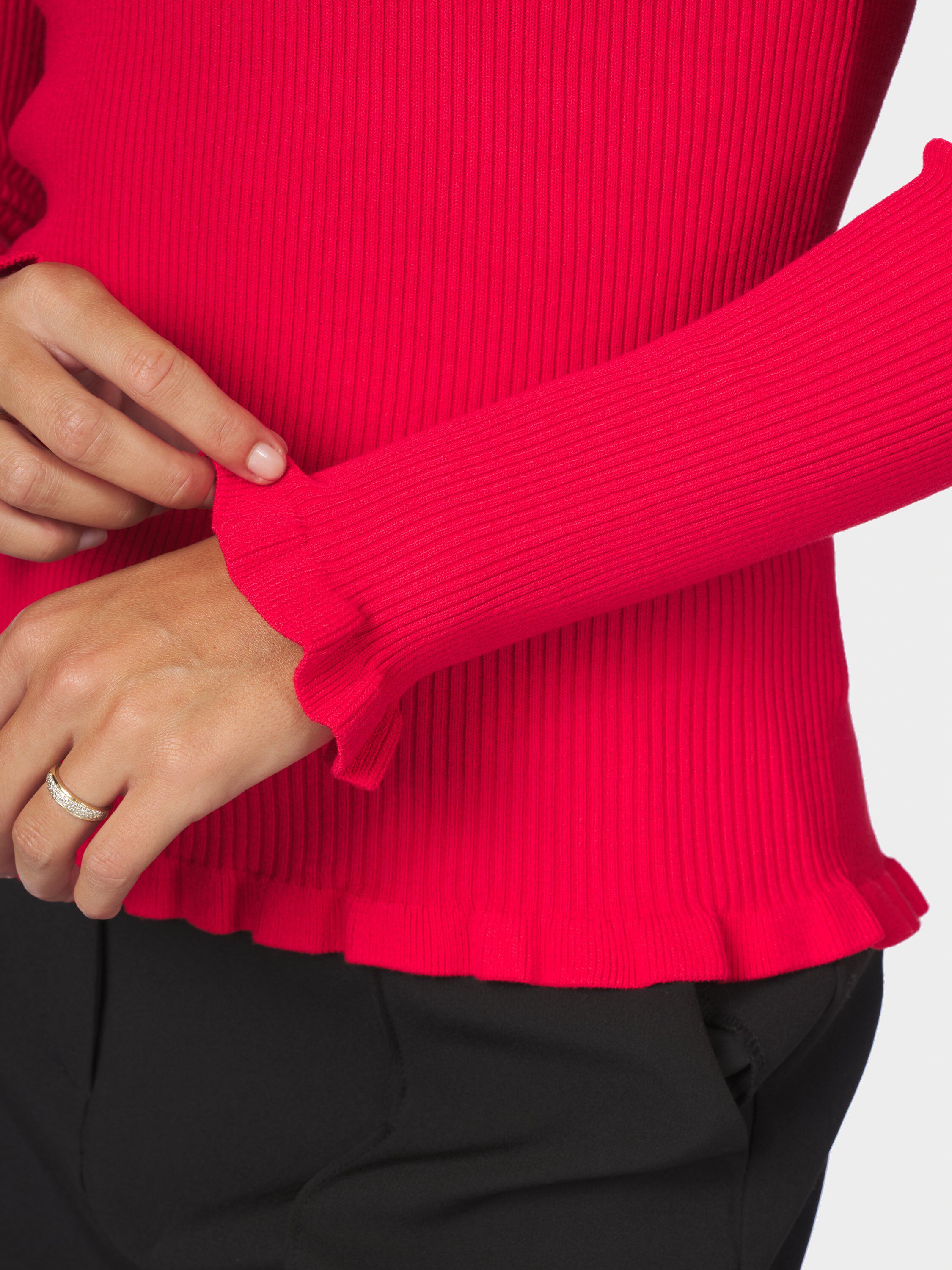 Nelle solid stickad blus