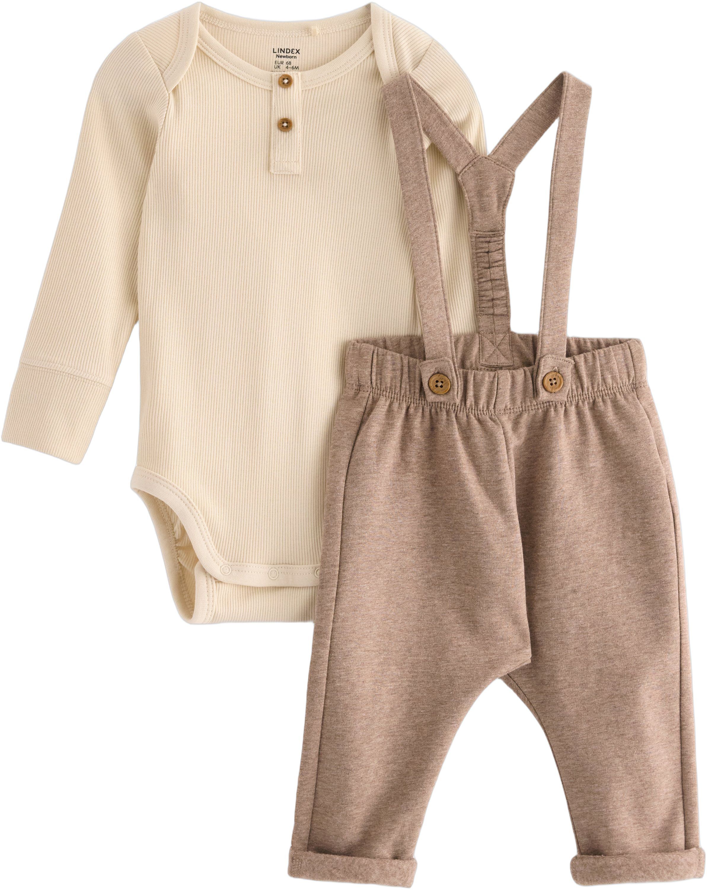 Bl&oslash;dt s&aelig;t i bomuld med en lang&aelig;rmet