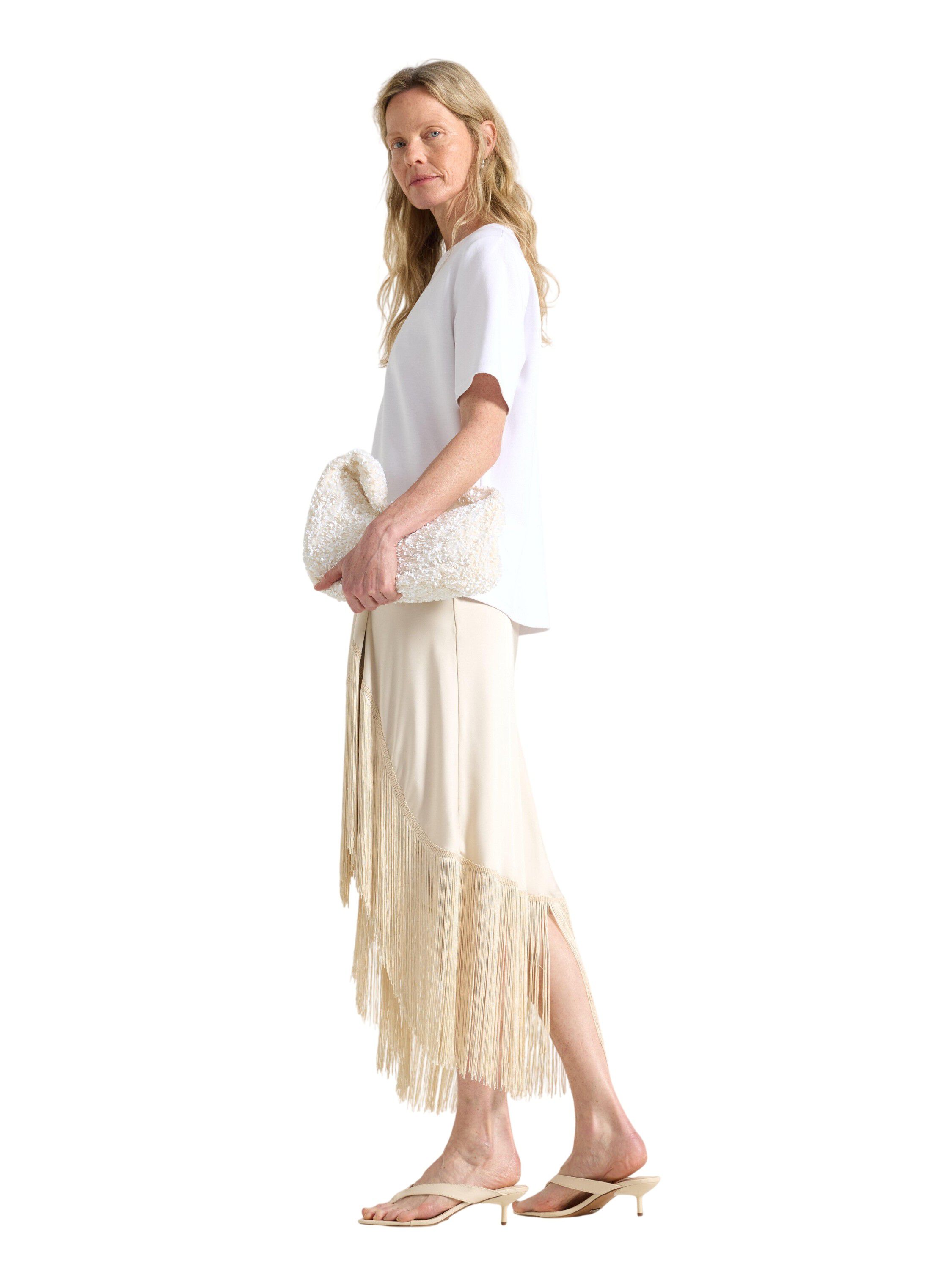 Satin skirt with fringe details.