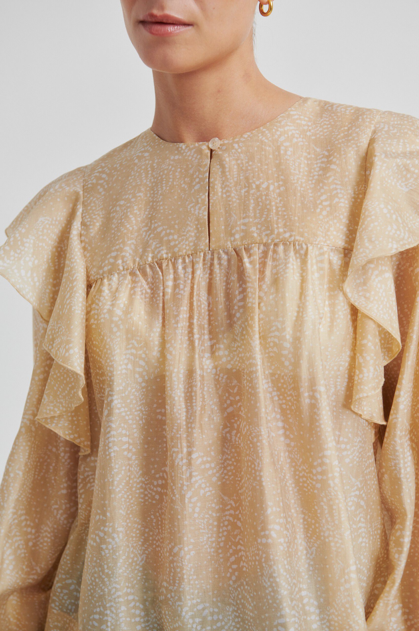 Hide Ruffle Blouse