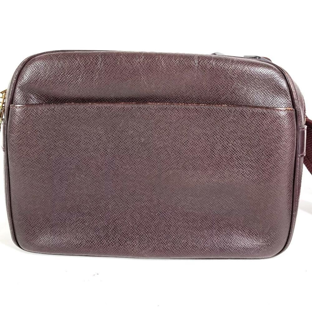 Louis Vuitton Reporter