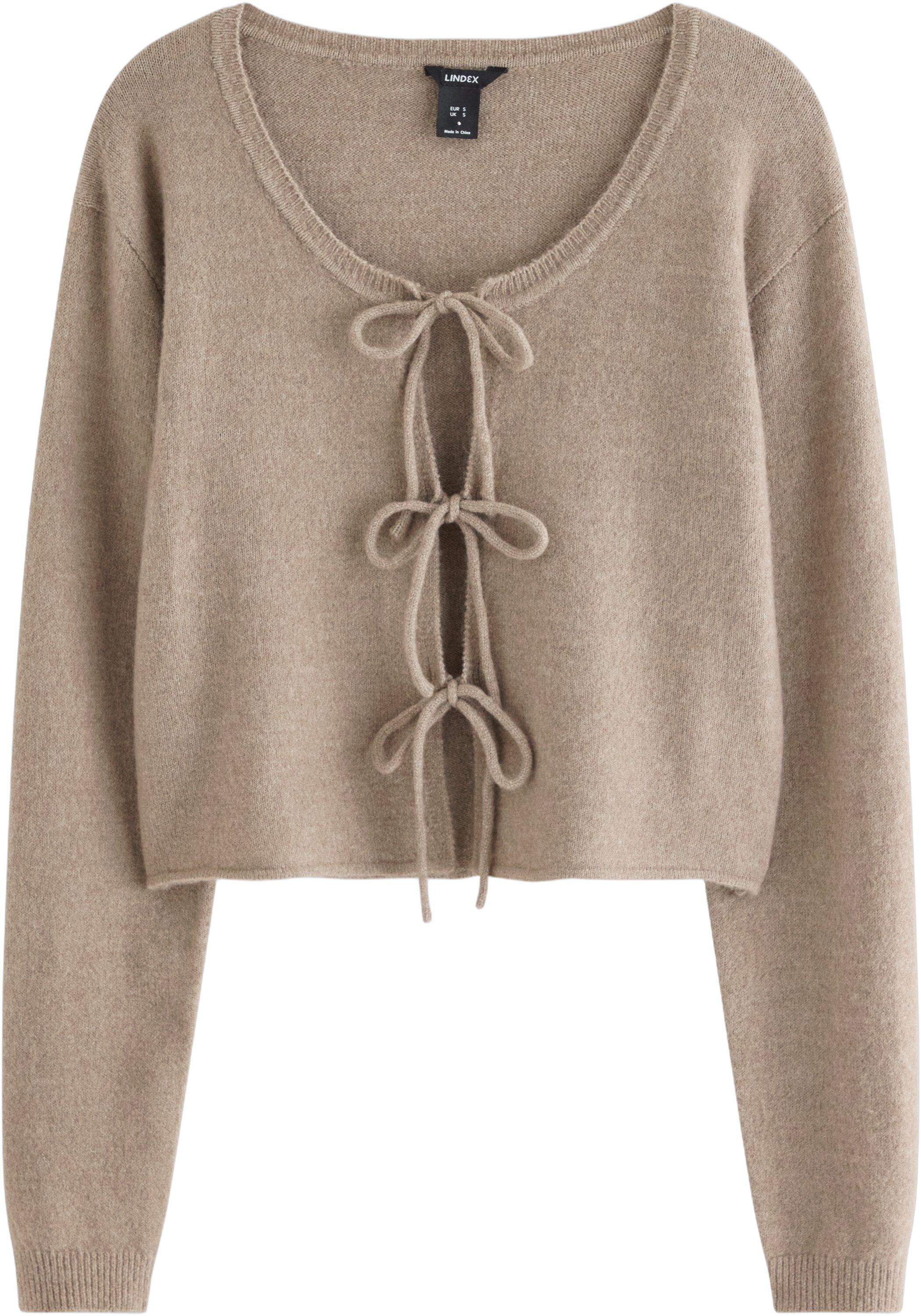 Myk, strikket cardigan med rund hal