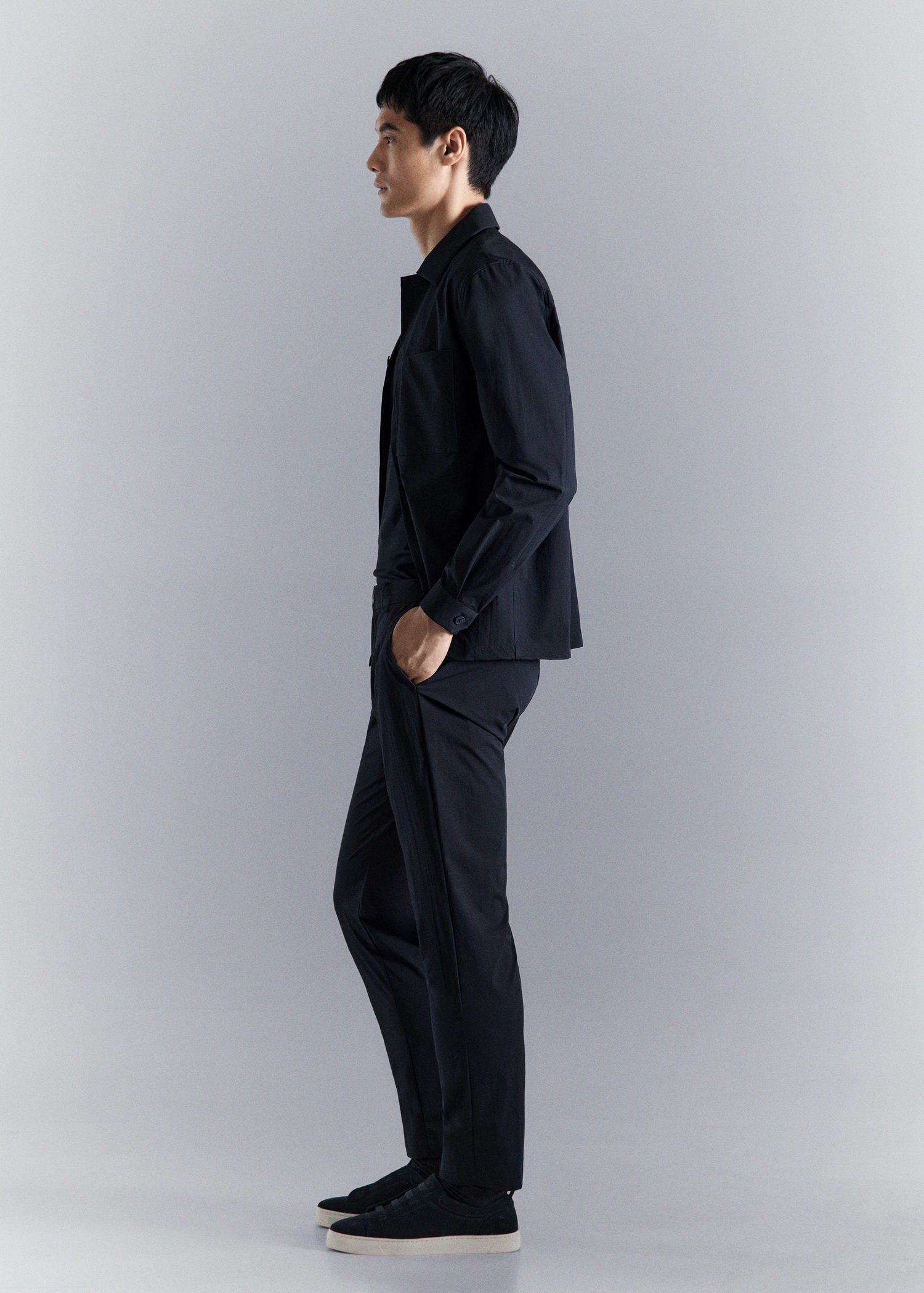 Stretch fabric slim-fit trousers wi