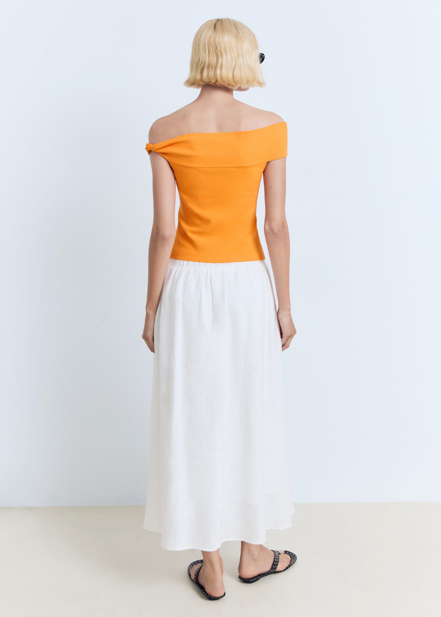 Asymmetrical strapless top