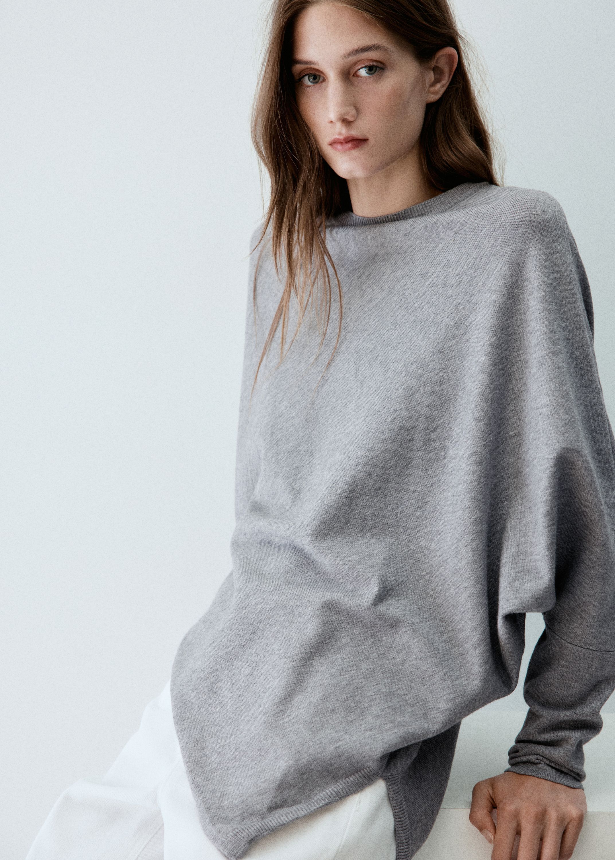 Asymmetric hem sweater