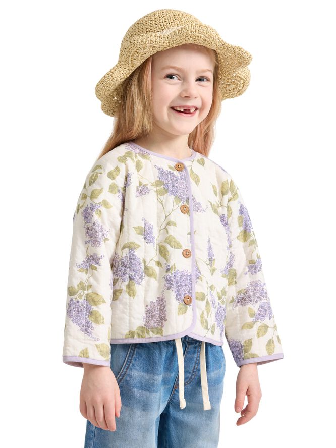 Jacket in quilted material with but
