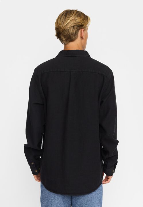 A casual overshirt in a structured garment dyed cotton fabri