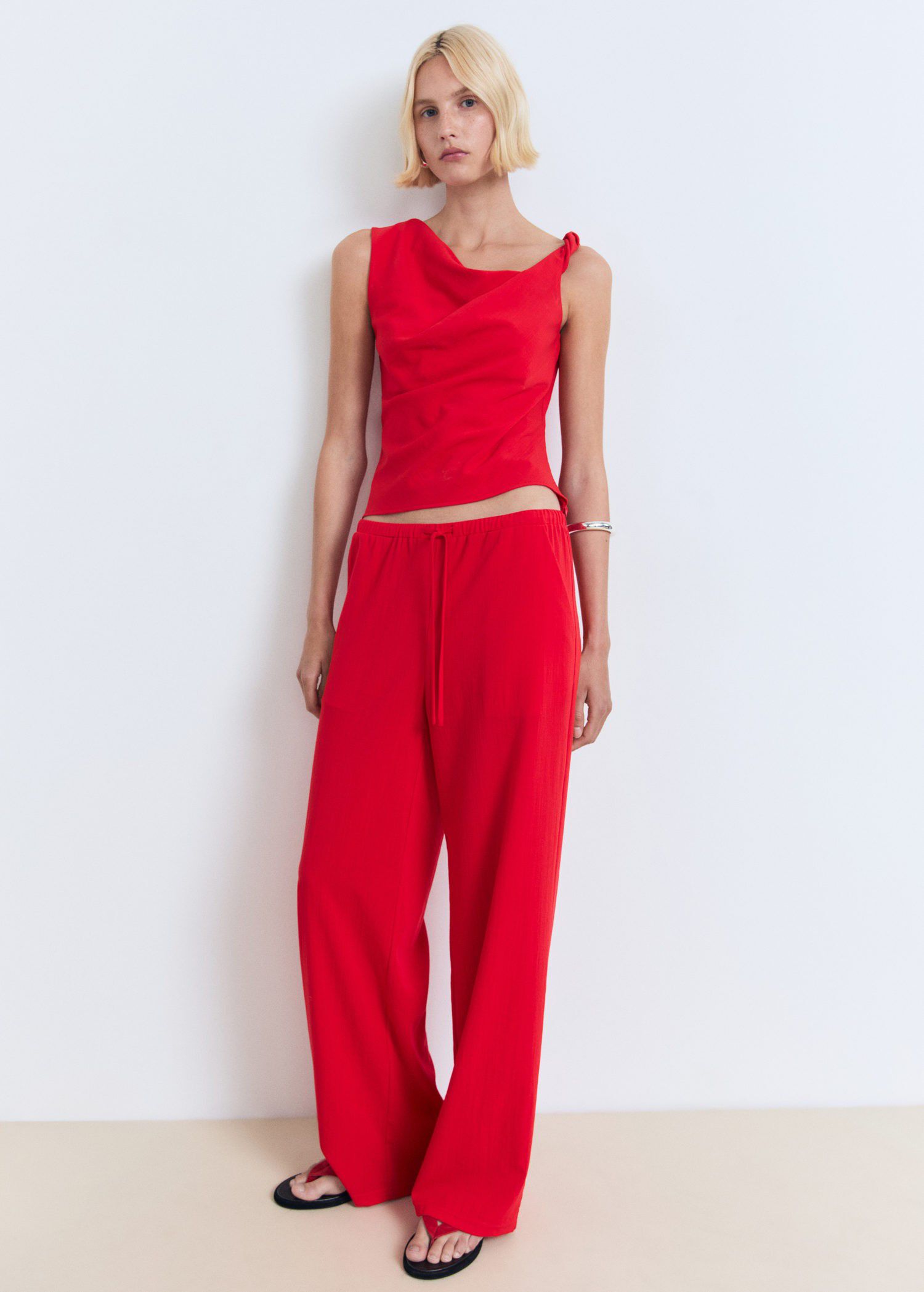 Asymmetrical draped top with straps