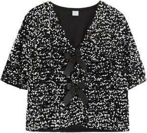 Kortärmad topp med paljetter och ro